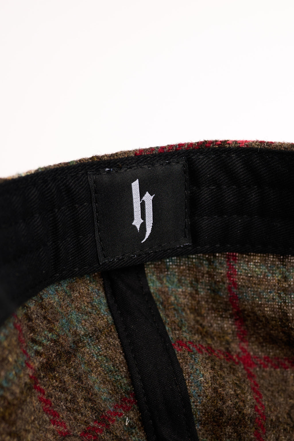 „Haters motivate me“ Flanell Karo Cap