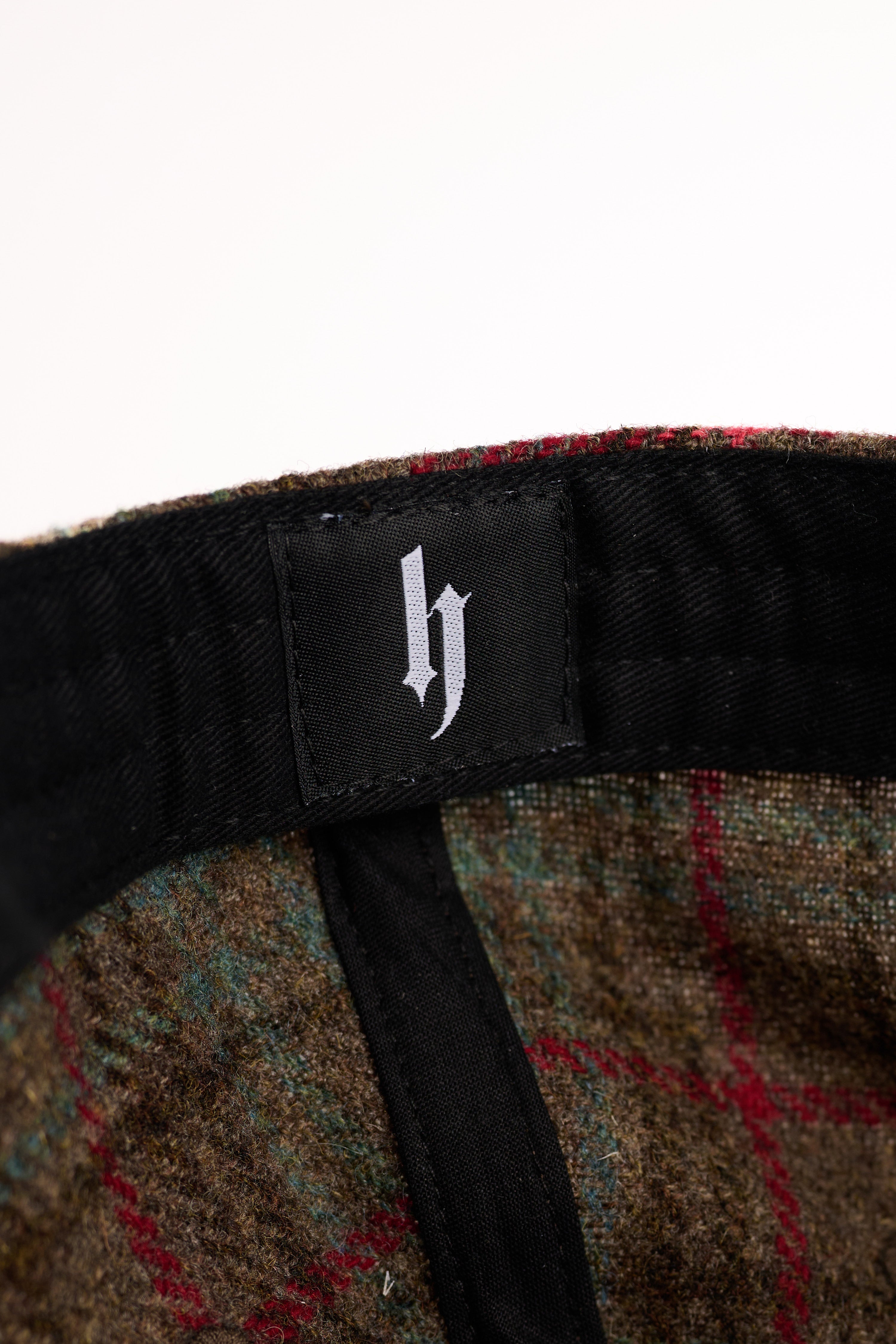 „Haters motivate me“ Flanell Karo Cap